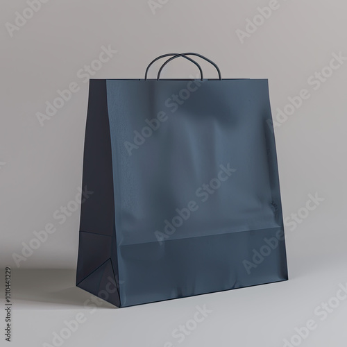 Obraz na płótnie Smooth, deep navy bag with crisp lines, upright against a plain gray backdrop, faint shadows visible. w salonie