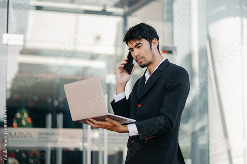 Confident Businessman in Suit Holding Tablet and Coffee Outdoors Urban Professional Work