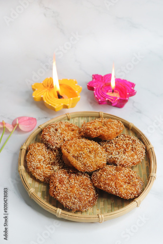 Anarsa is a popular Indian sweet made from rice, sugar, ghee, and poppy seeds. Traditionally part of Diwali Faral, Anarase is a crisp, rice based pastry enjoyed during the festive season. copy space. photo