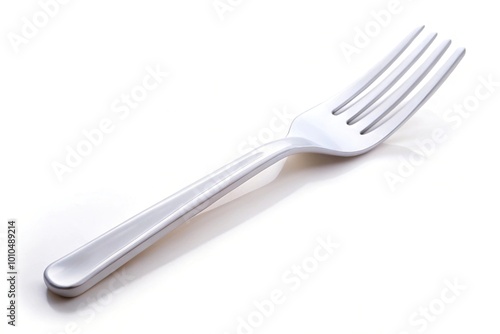 Extreme close-up plastic fork on white background