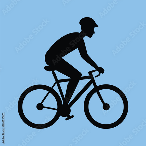 silhouette of a person riding a bicycle