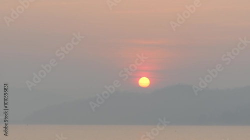 Mountains and sunrise Lam Ta Phoen Reservoir in Thailand photo