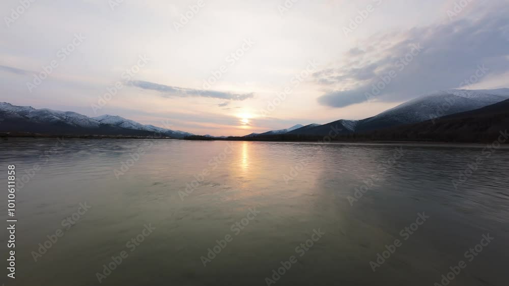 Experience the peaceful awakening of dawn, where soft sunlight dances on still waters. Majestic mountains frame this stunning landscape, showcasing nature's untouched elegance. Experience the peaceful awakening of dawn, where soft sunlight dances on still waters. Majestic mountains frame this stunning landscape, showcasing nature's untouched elegance.