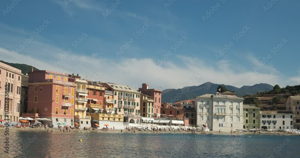 Bay of water. Silence Bay in Sestri Levante.Famous beach on the Ligurian sea with typical houses and boats. Italy Bay of water. Silence Bay in Sestri Levante.Famous beach on the Ligurian sea with typical houses and boats. Italy