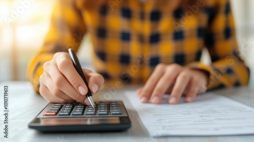 Professional tax preparer or consultant reviewing and analyzing the financial statements tax documents and accounting records of a small business owner photo