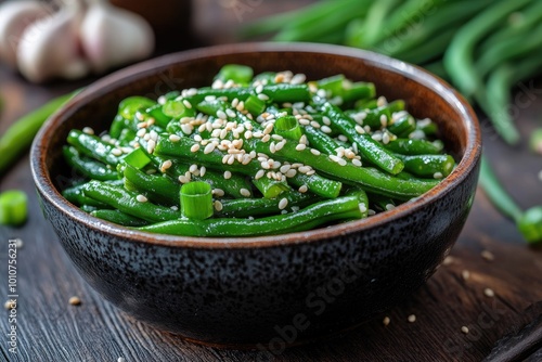 Green beans with sesame seeds in a bowl. Perfect for illustrating a healthy, home-cooked meal or a side dish.