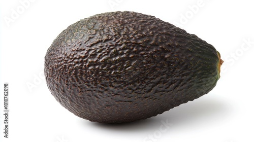 A single, ripe avocado with a dark green skin and a slight indent at the top, isolated on a white background. photo