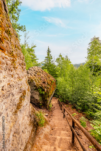 Hiking to Maria or Mariina skala wooden viewpoint built on a rock. It offers a beautiful view of the town of Jetrichovice in Bohemian Switzerland photo