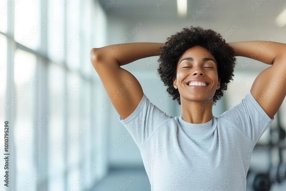 A joyful woman enjoying her fitness routine, showcasing confidence and happiness in a gym environment with natural light. A joyful woman enjoying her fitness routine, showcasing confidence and happiness in a gym environment with natural light.