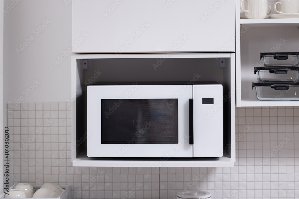 white microwave on kitchen cabinet shelf white microwave on kitchen cabinet shelf