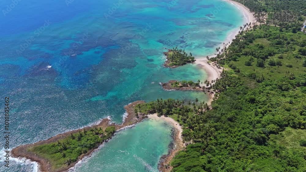 Amazing landscape of Playa Los Coquitos beach and coast, Cabrera in Dominican Republic. Aerial high angle Amazing landscape of Playa Los Coquitos beach and coast, Cabrera in Dominican Republic. Aerial high angle