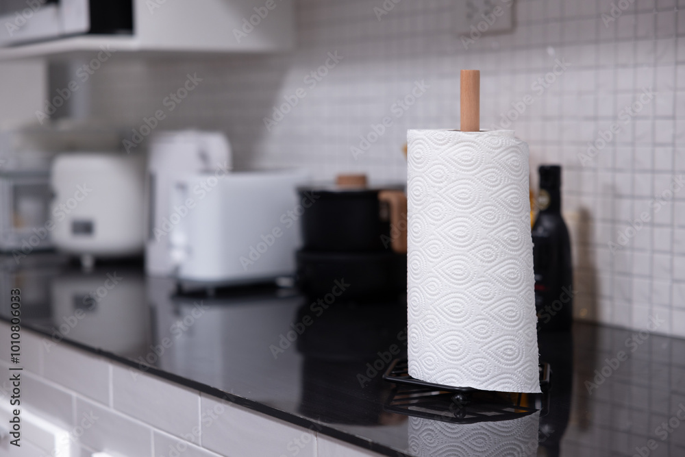 © Teerapong - Rolling tissue paper on the kitchen counter © Teerapong - Rolling tissue paper on the kitchen counter