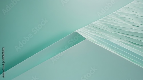 Textured Mint Green Surface With Layered Folds and Smooth Edges Creating an Abstract Design