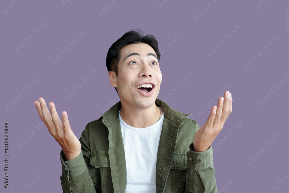 Portrait of excited young guy isolated on purple background Portrait of excited young guy isolated on purple background