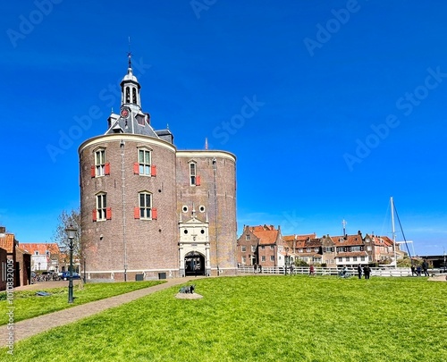 The old city gate De Drommedaris of the city of Enkhuizen. photo