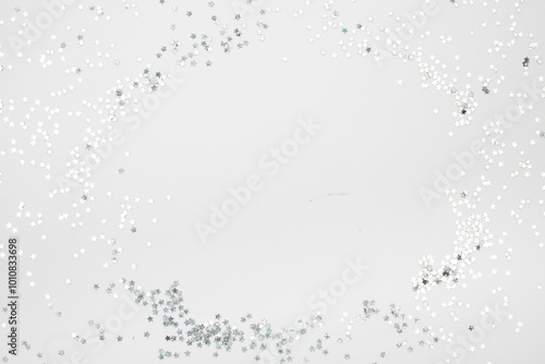 sparkles silver stars on white background with text place- Image
