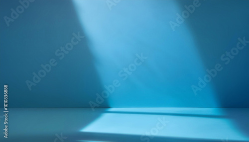 Abstract blue color gradient studio background for product presentation. Empty room with Natural sunlight shadows. empty room with copy space