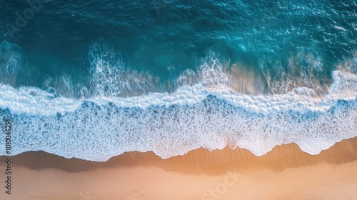 Aerial view of the Vietnamese coastline, with ocean waves gently lapping against the sandy shore, ideal for summer vacation or travel themes.