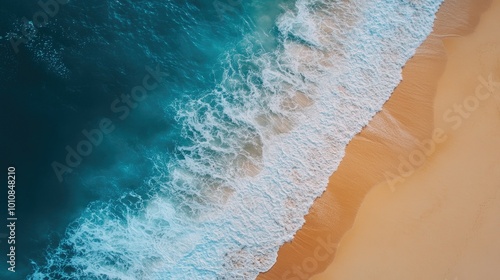 Beautiful aerial shot of a tropical Vietnam beach with blue ocean waves washing over the sand, perfect for summer travel and vacation themes.