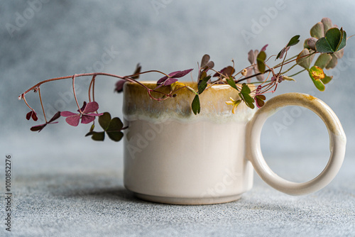 Ceramic mug adorned with shamrock and delicate florals photo