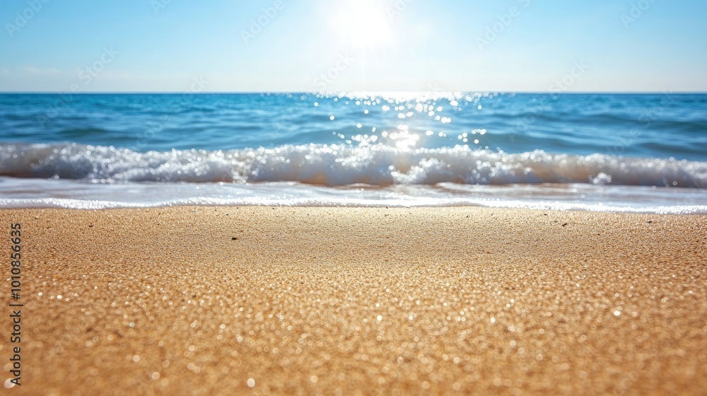 Φωτογραφία Fine beach sand in the foreground, leading to the gently rolling waves of the sea in the background under the bright summer sun