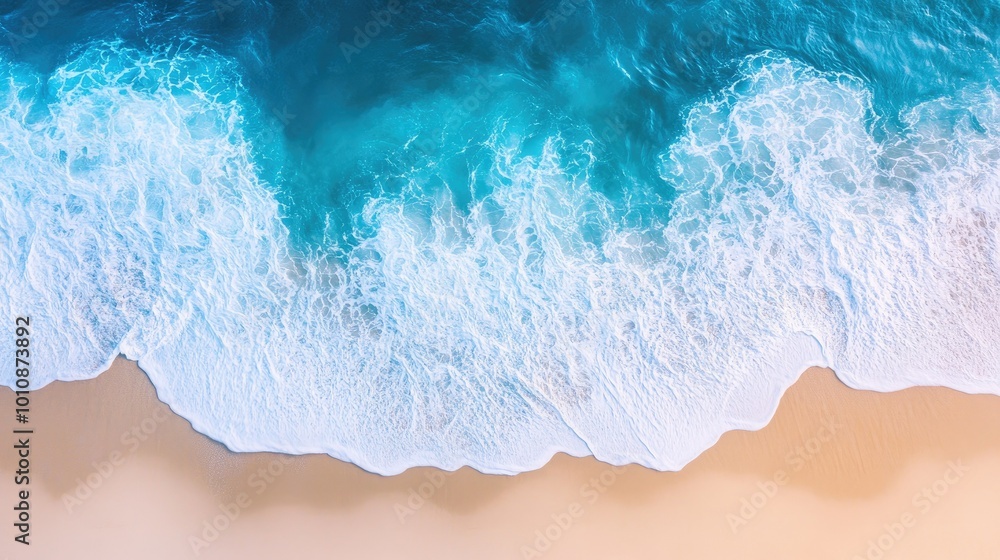 Top-down view of ocean waves breaking onto a peaceful Vietnam beach, with shades of blue and sandy textures creating a perfect holiday background. Top-down view of ocean waves breaking onto a peaceful Vietnam beach, with shades of blue and sandy textures creating a perfect holiday background.