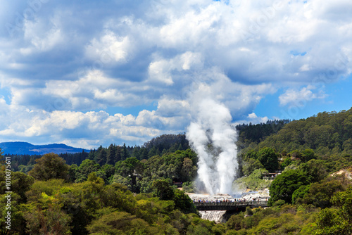 Rotorua at North Island, New Zealand - February 28, 2020: Hot spring vapor rising into the sky at Pohutu Geyser photo