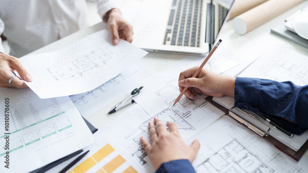 Architecture drawing on architectural project business architecture building construction Colleagues designer Planning Design on blueprint and compasses Architecture drawing on architectural project business architecture building construction Colleagues designer Planning Design on blueprint and compasses