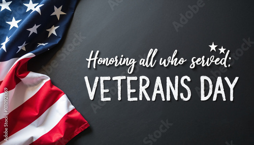 A folded American flag on a black background with chalk-style text reading 