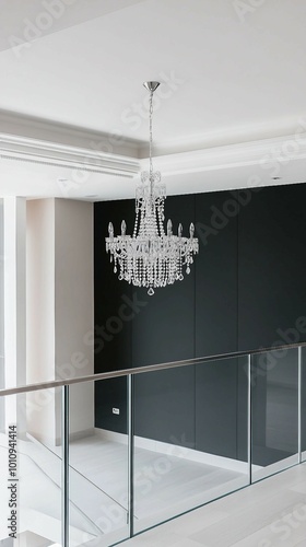 Modern Crystal Chandelier in Contemporary Interior with Glass Railing photo