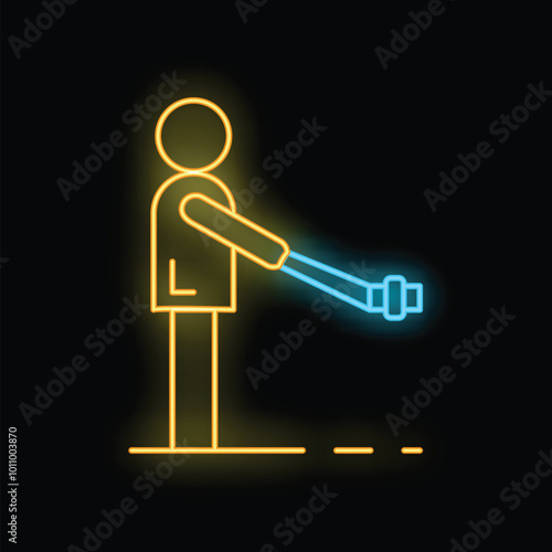 Yellow neon style icon of a videographer holding a cinema camera on a black background