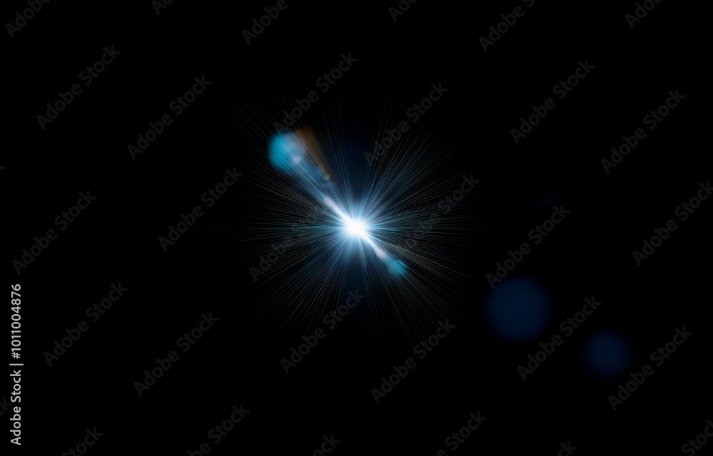 A bright blue light with radial rays bursts from the center of a dark background. A bright blue light with radial rays bursts from the center of a dark background.