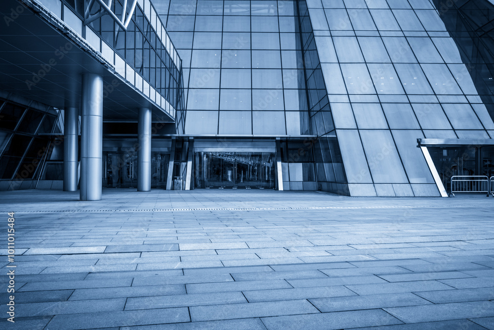 Fototapeta premium Modern Architectural Design Emphasizing Glass and Steel Facade