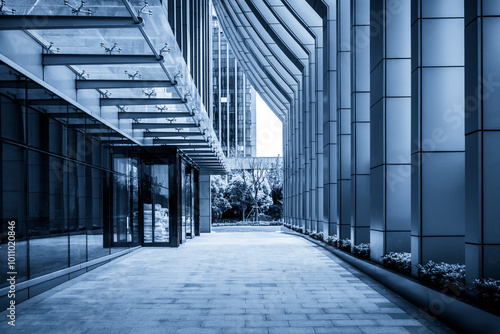 Contemporary Urban Pathway Flanked by Sleek Glass Structures