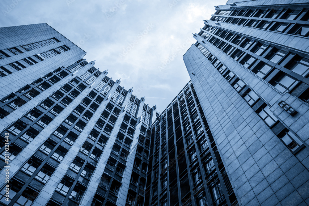 Captivating Perspective of Modern Skyscrapers Against a Cloudy Sky Captivating Perspective of Modern Skyscrapers Against a Cloudy Sky