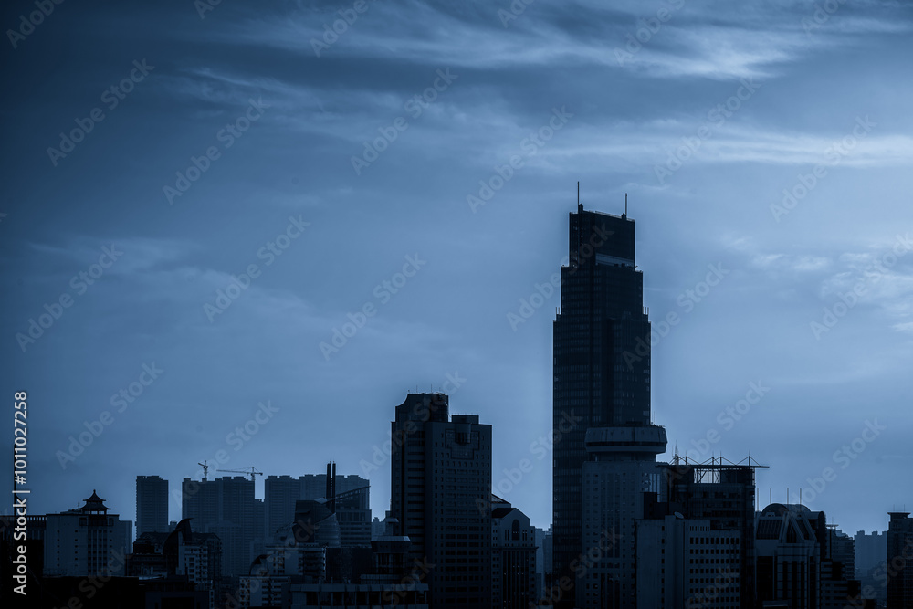 Urban Skyline at Dusk with Dramatic Blue Tones Urban Skyline at Dusk with Dramatic Blue Tones