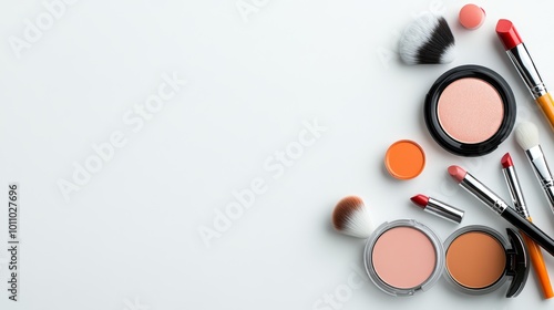 Makeup Brushes and Cosmetics Flat Lay on White Background