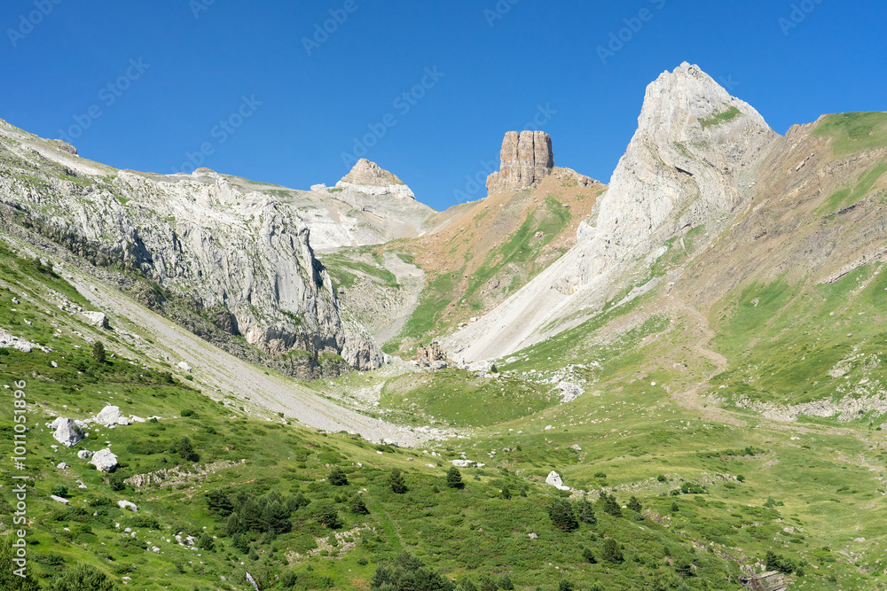 Aisa valley mountains at sunset in the occidental pyrenees valleys in the north of Spain. Huesca, Aragón, Spain. Aisa valley mountains at sunset in the occidental pyrenees valleys in the north of Spain. Huesca, Aragón, Spain.