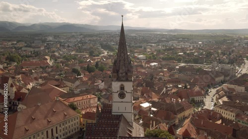 Wallpaper Mural 4k cinematic drone stock footage of an old church in an old style city center in Romania with an amazing backround at sunset Torontodigital.ca