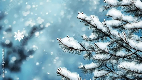 A snow covered tree branch with snowflakes falling on it. The image has a serene and peaceful mood, with the snow creating a sense of calmness and tranquility