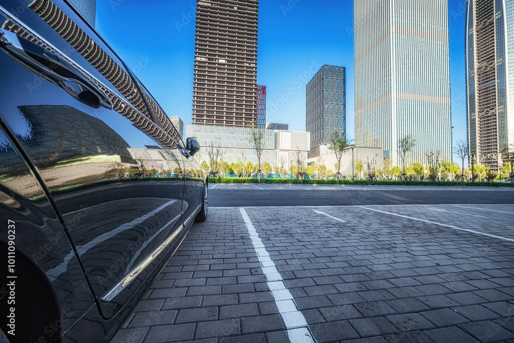 Fototapeta premium Sunlight on Urban Skyscrapers with Clear Blue Sky