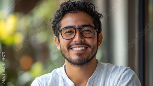 Latino Hispanic Man Architect - man, glasses, smile, casual, portrait, happy, sitting, light, relaxed, indoors, confident, positive, casual attire, expression, cheerful, young adult