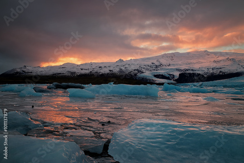 ice floes on the black sea sand and the coast Fjallsarlon lagoon photo