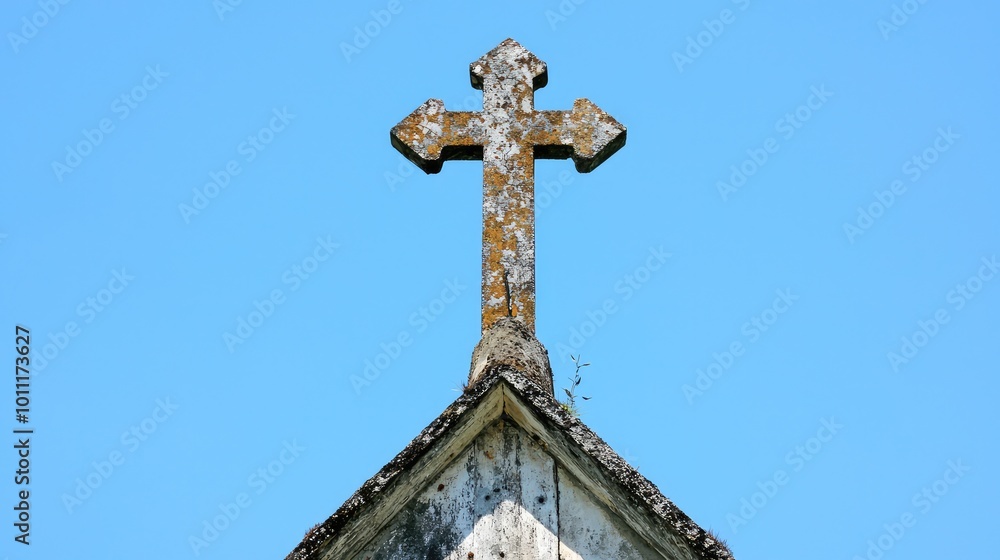A weathered cross atop a rustic church against a clear blue sky, symbolizing faith and spirituality in a serene setting. A weathered cross atop a rustic church against a clear blue sky, symbolizing faith and spirituality in a serene setting.