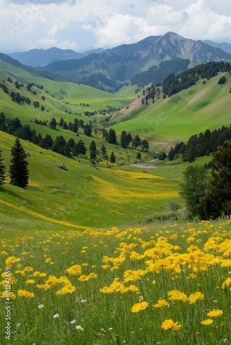 A beautiful, lush green valley with a mountain in the background. The valley is filled with yellow flowers and trees