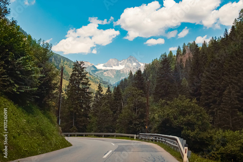 Alpine summer view with the legendary Mount Großglockner in the background at Kalser Glocknerstrasse High Alpine Road, Kals am Großglockner, Lienz, Eastern Tyrol, Austria photo