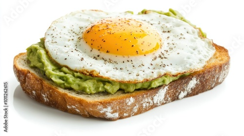 A beautifully plated avocado toast topped with a sunny-side-up egg, isolated on a white background, perfect for healthy breakfast concepts.