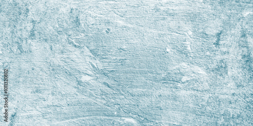 Abstract grunge decorative light blue background. Venetian-style light stucco with space for design. Blue-gray cement concrete texture with a grunge, rough, old-stain background