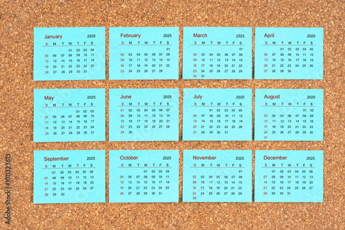 2025 calendar on adhesive notes, On the wooden. photo