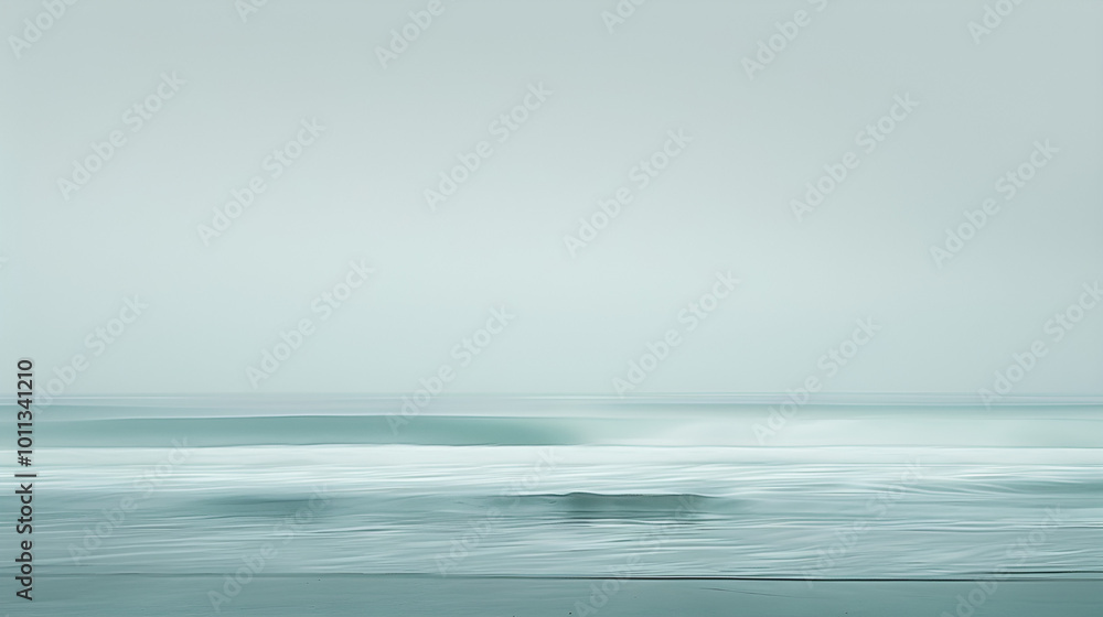Obraz premium A serene beach scene with turquoise waves gently lapping at the shore under a bright blue sky and soft clouds, capturing the beauty of summer by the sea